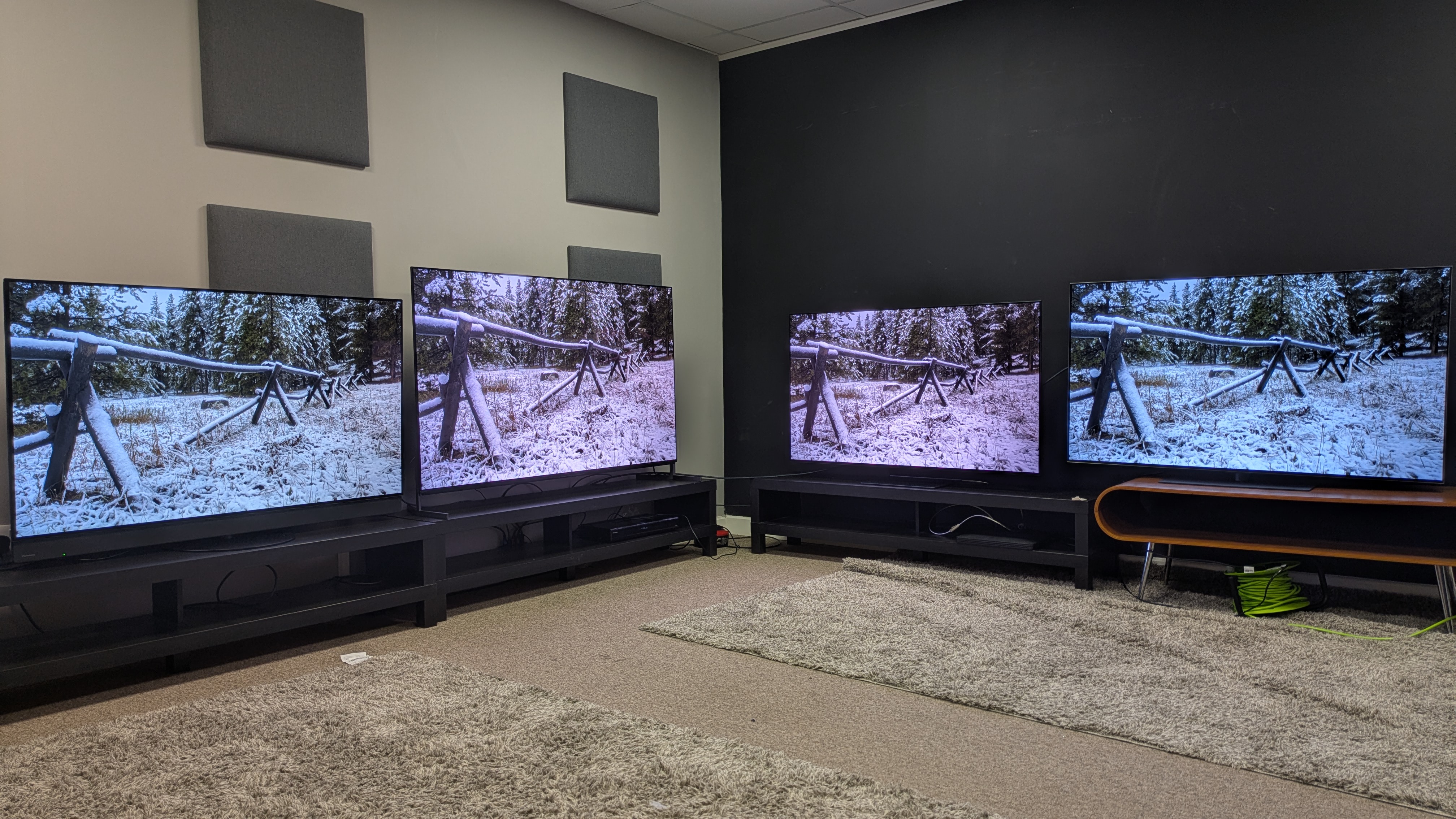 Panasonic Z95B (far left) Sony Bravia 8 II (middle left) Samsung S95F (middle right) LG G5 (far right) with snow scene on screen