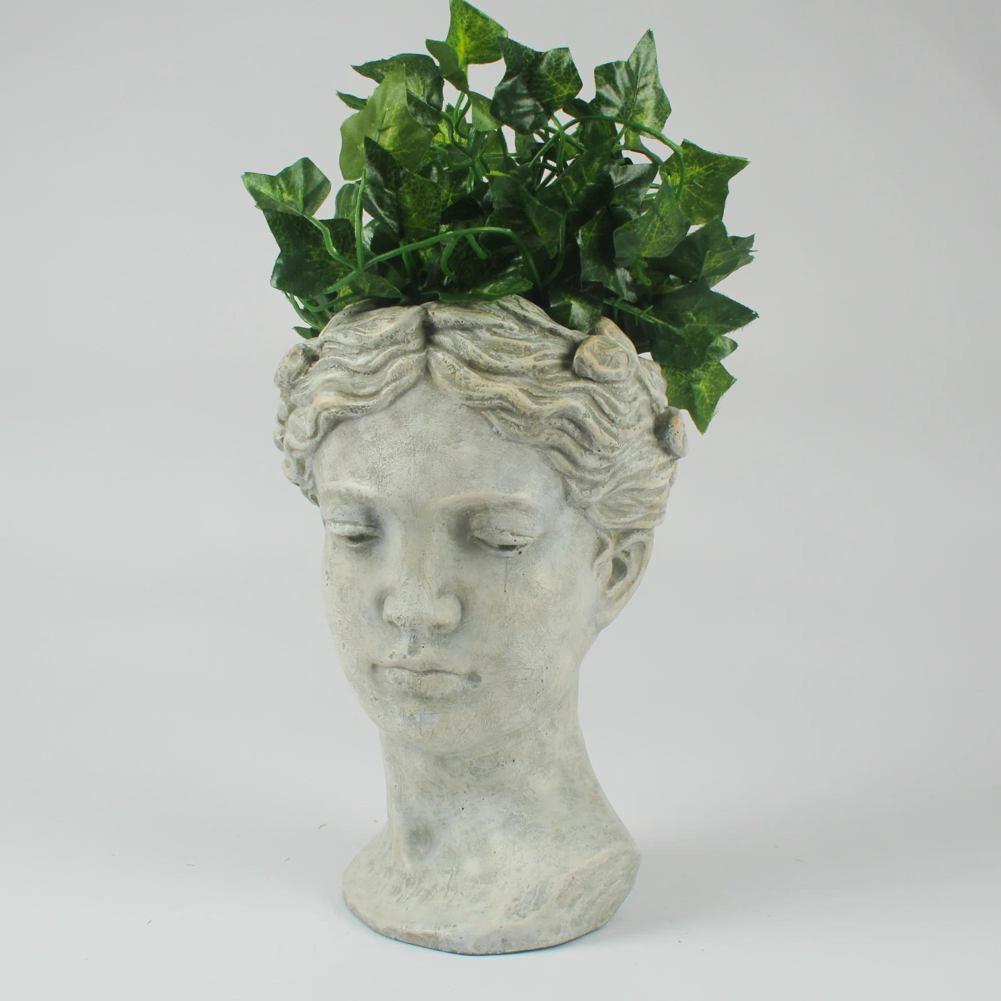 Statue head planter