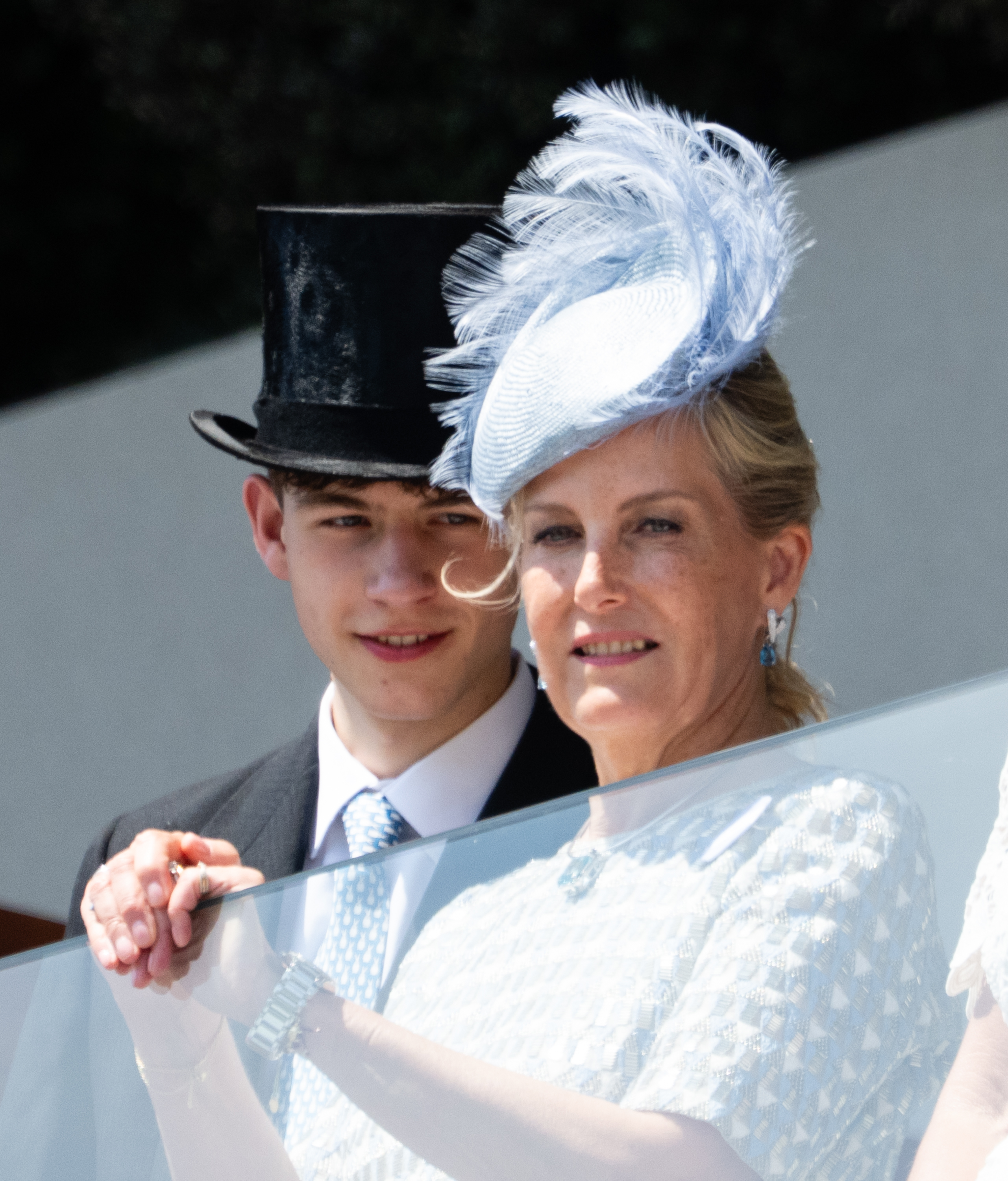 James Wessex wearing a top hat and standing next to Duchess Sophie on a balcony at Royal Ascot