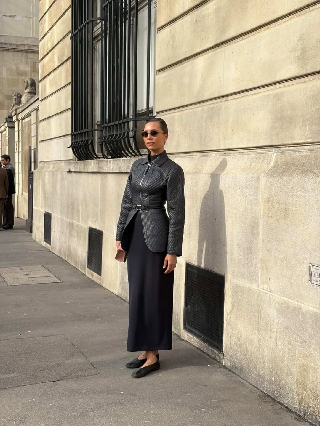 TyLynn Nguyen in glove flats.