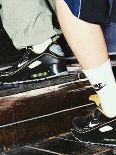 Slam Jam Model wearing black Nikes 