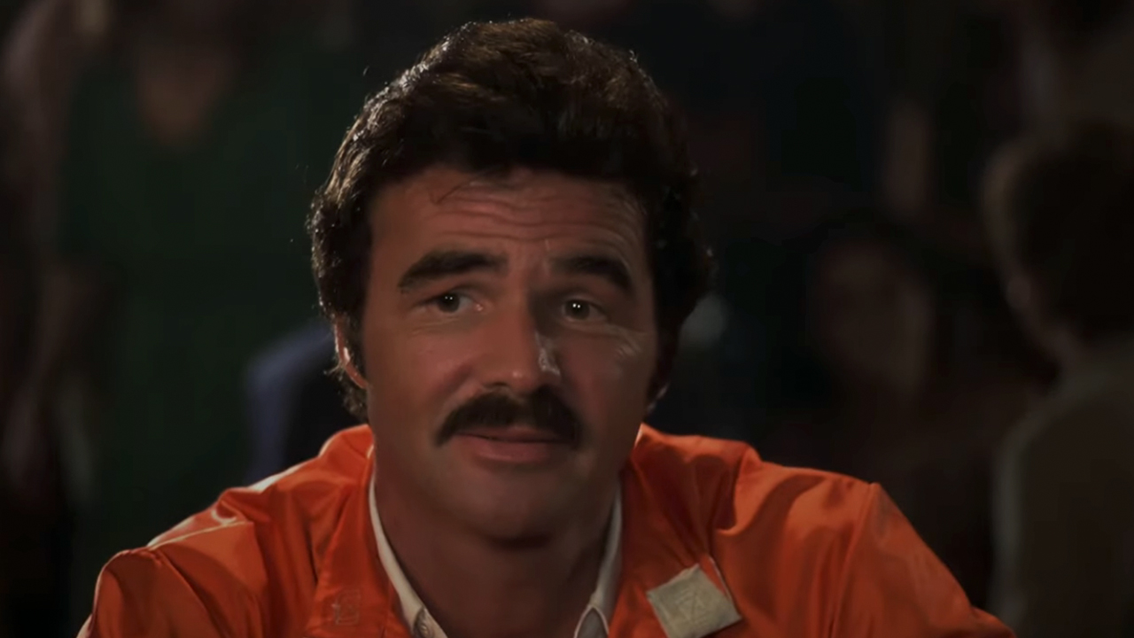 A close up of Burt Reynolds looking bemused in The Cannonball Run