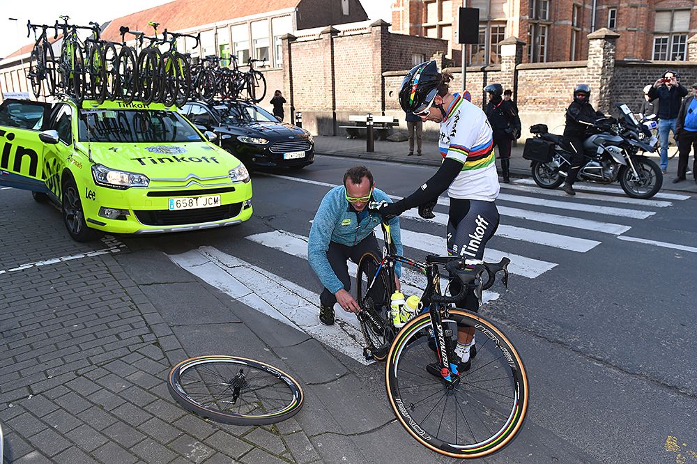 Peter Sagan (Tinkoff) gets a wheel change at Kuurne-Brussel-Kuurne