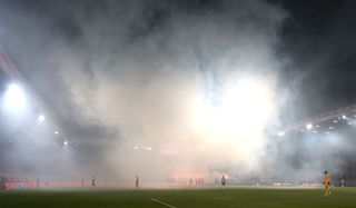 General view inside the stadium as flares goes off during the Bundesliga match between 1. FC Union Berlin and Hertha BSC at Stadion An der Alten Foersterei on November 02, 2019 in Berlin, Germany.
