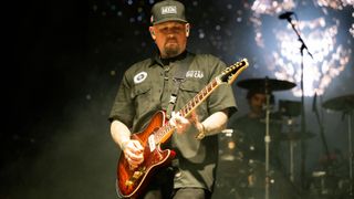 Benji Madden performing live with Suhr guitar, shot by Scott Dudelson
