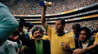 Carlos Alberto, captain of Brazil, with the World Cup trophy, 1970