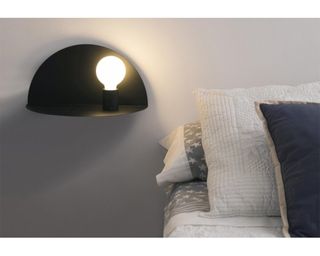 A bedroom wall lighting idea with in-built shelf by Faro Barcelona