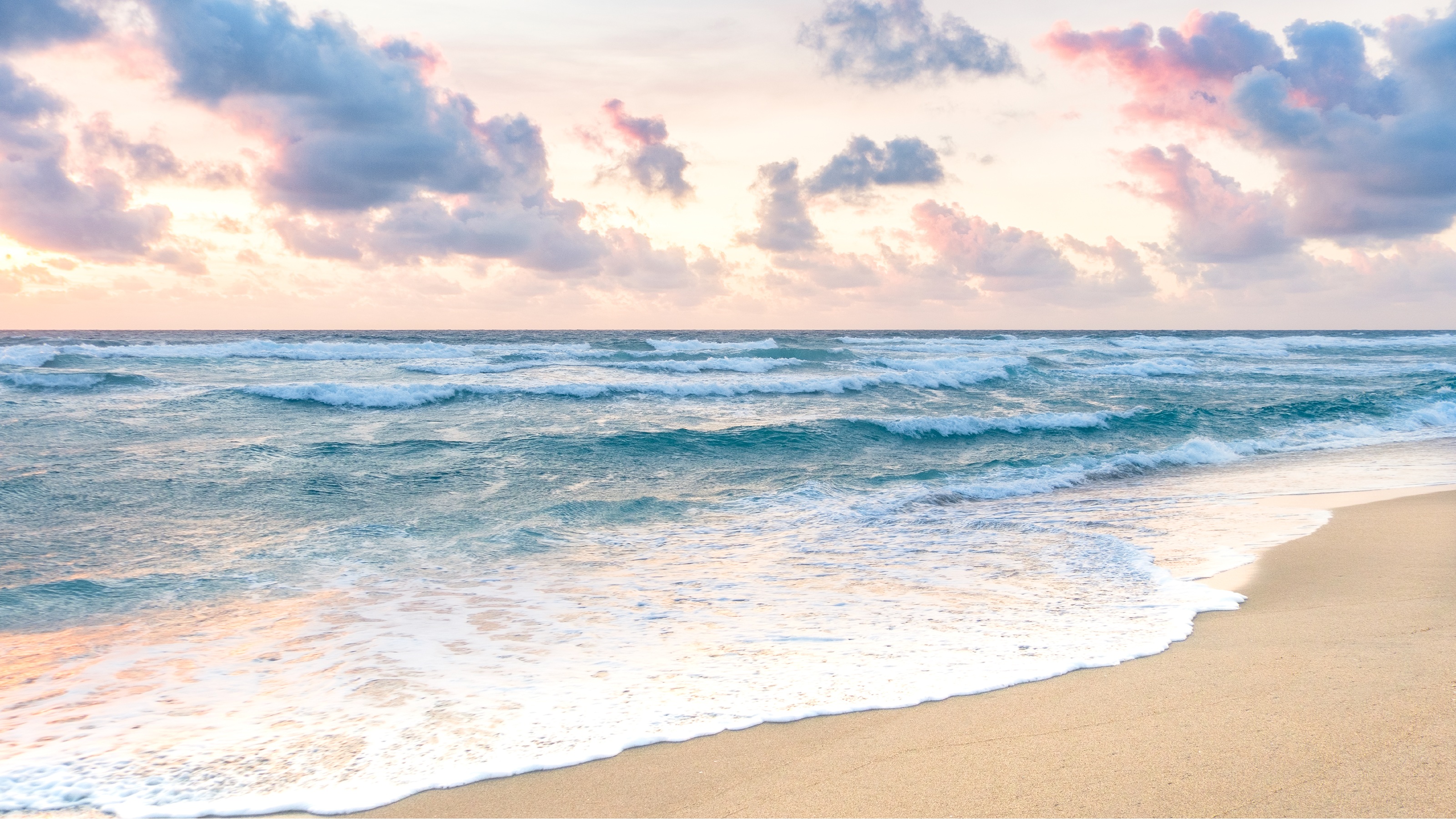 A beach in Florida with pretty clouds.