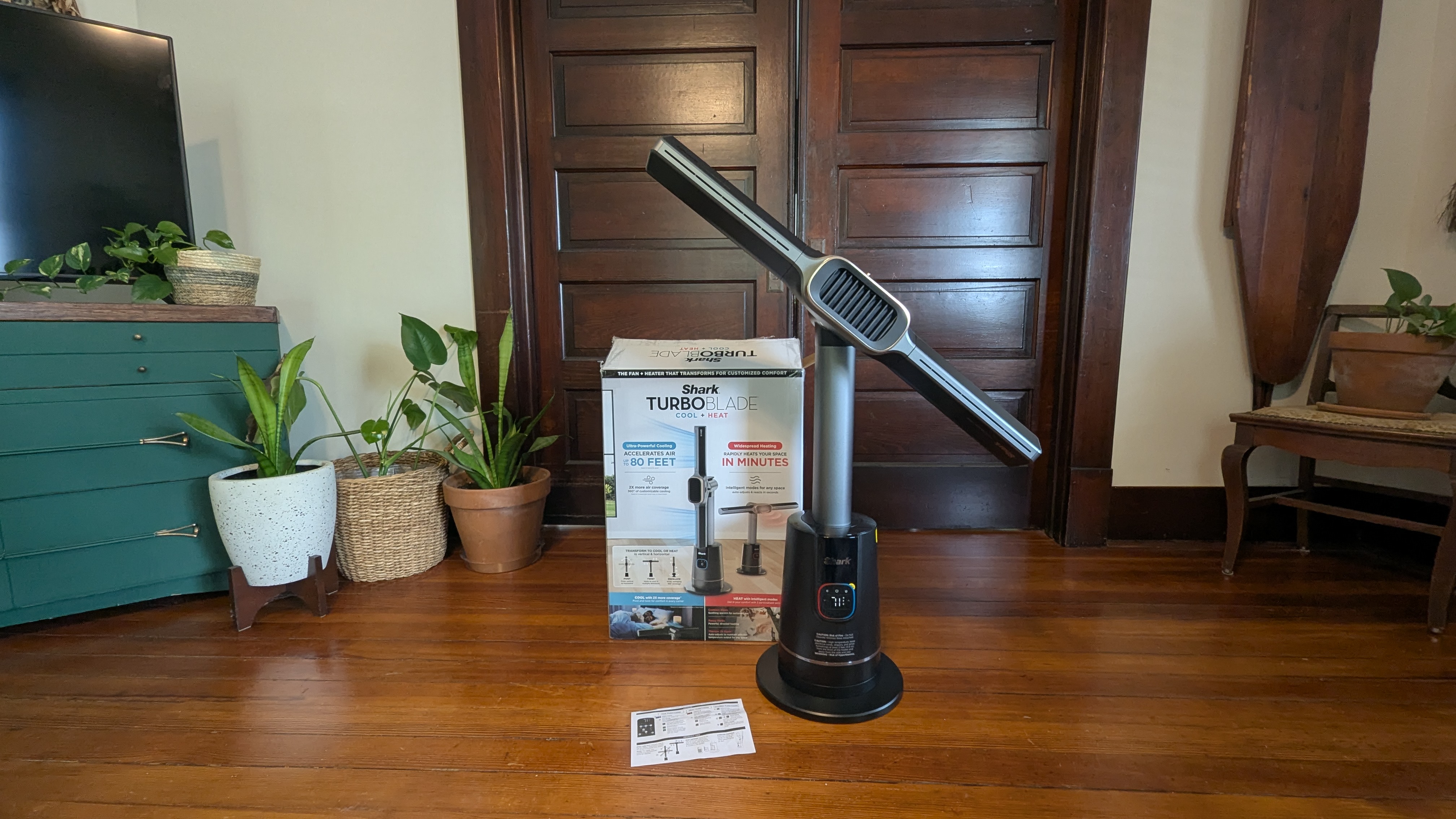 Shark TurboBlade Cool + Heat next to its box in reviewer's home
