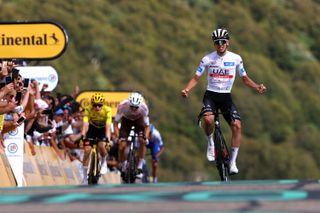 LE-MARKSTEIN, FRANCE - JULY 22: Tadej Pogacar of Slovenia and UAE Team Emirates - White best young jersey celebrates at finish line as stage winner ahead of Felix Gall of Austria and Ag2R CitroÃ«n Team and Jonas Vingegaard of Denmark and Team Jumbo-Visma - Yellow leader jersey during the stage twenty of the 110th Tour de France 2023 a 133.5km stage from Belfort to Le Markstein 1192m / #UCIWT / on July 22, 2023 in Le Markstein, France. (Photo by Michael Steele/Getty Images)