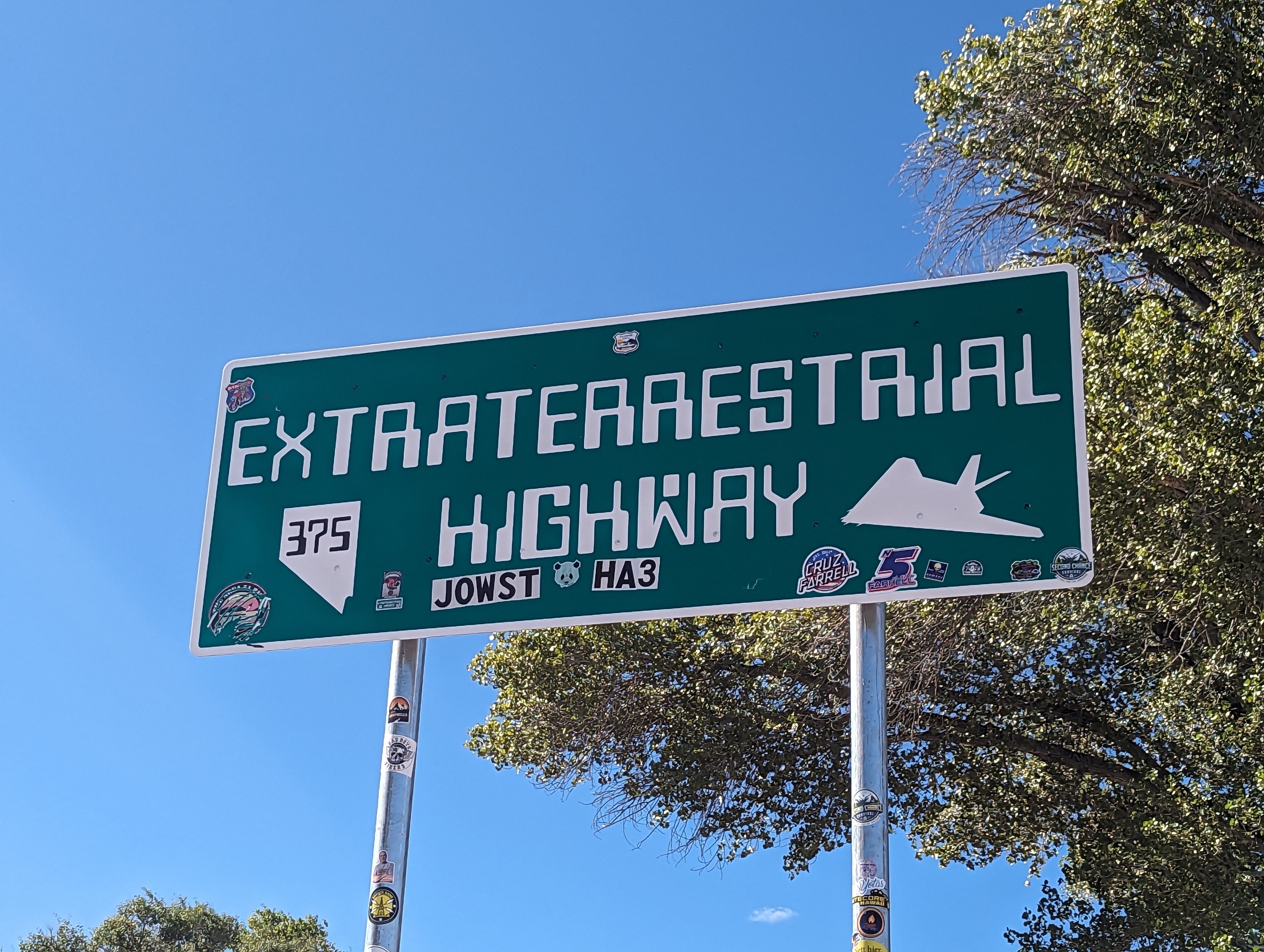 sign that reads extraterrestrial highway