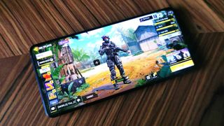 Asus ROG Phone 8 with COD Mobile main menu on screen
