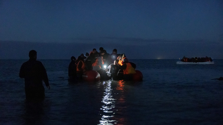 Small boat crossing the Channel at night