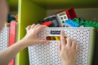 Toy storage in organizing a playroom