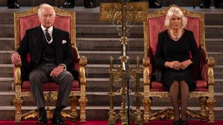 King Charles III and Camilla, Queen Consort take part in an address in Westminster Hall