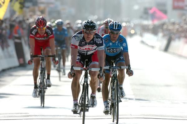 Andre Greipel (Lotto-Belisol) leads the second peloton home