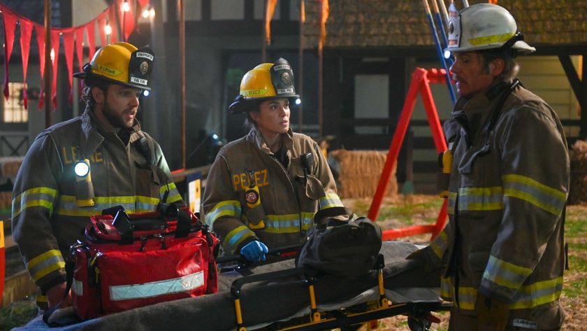 From left to right: Bode, Gabriela and Vince all standing around a gurney in Fire Country.