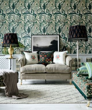 Sofa in maximalist living room and armchairs