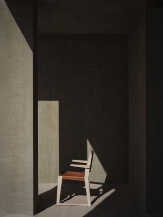 Wood & leather chair in the shadows