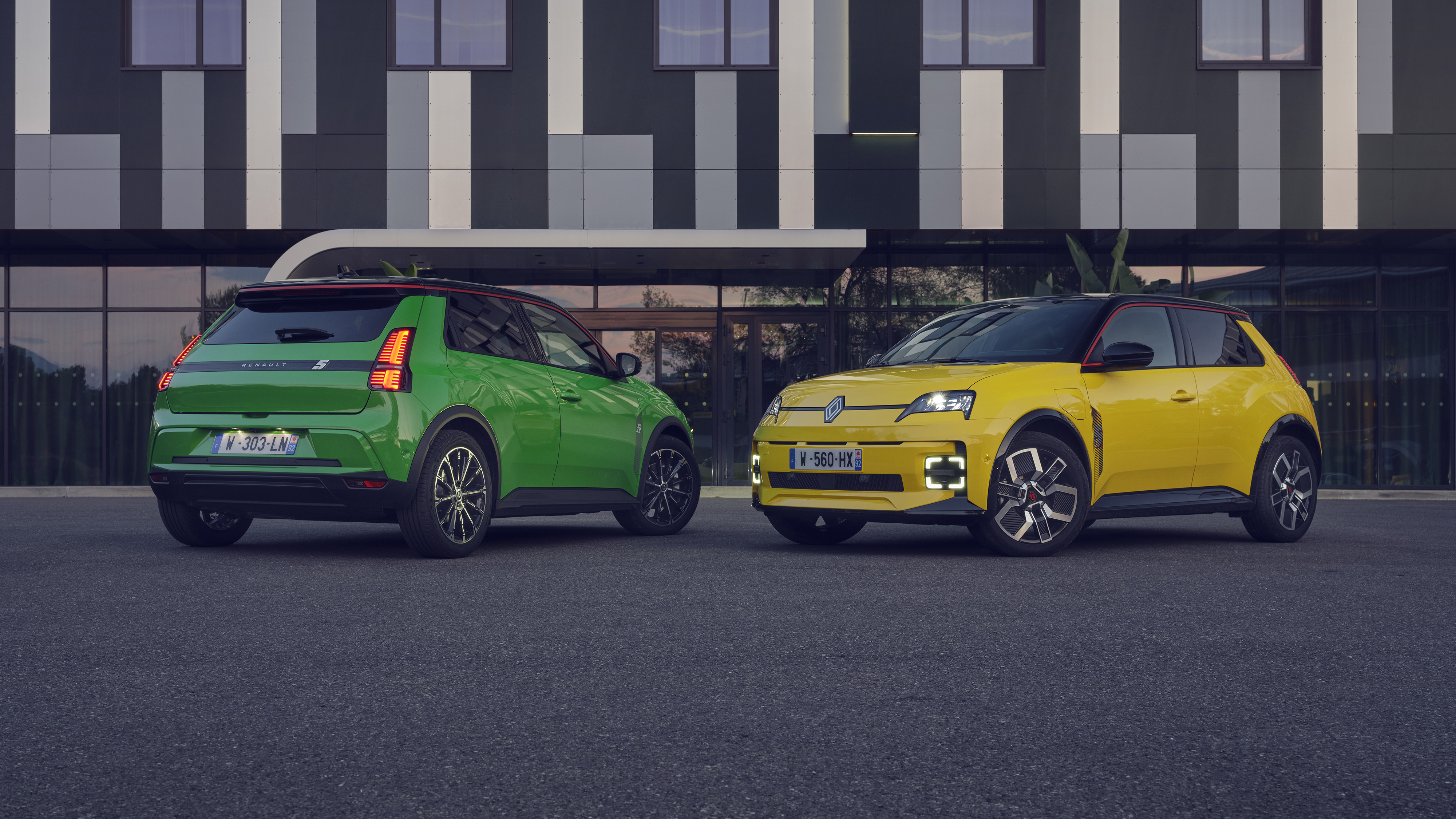 Two Renault 5 EV cars sat next to each other