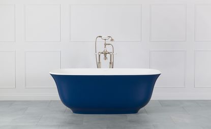 Blue 'Amiata' volcanic limestone bathtub by Victoria and Albert in white bathroom