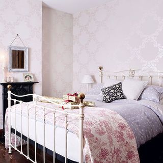 bedroom with pink printed wall