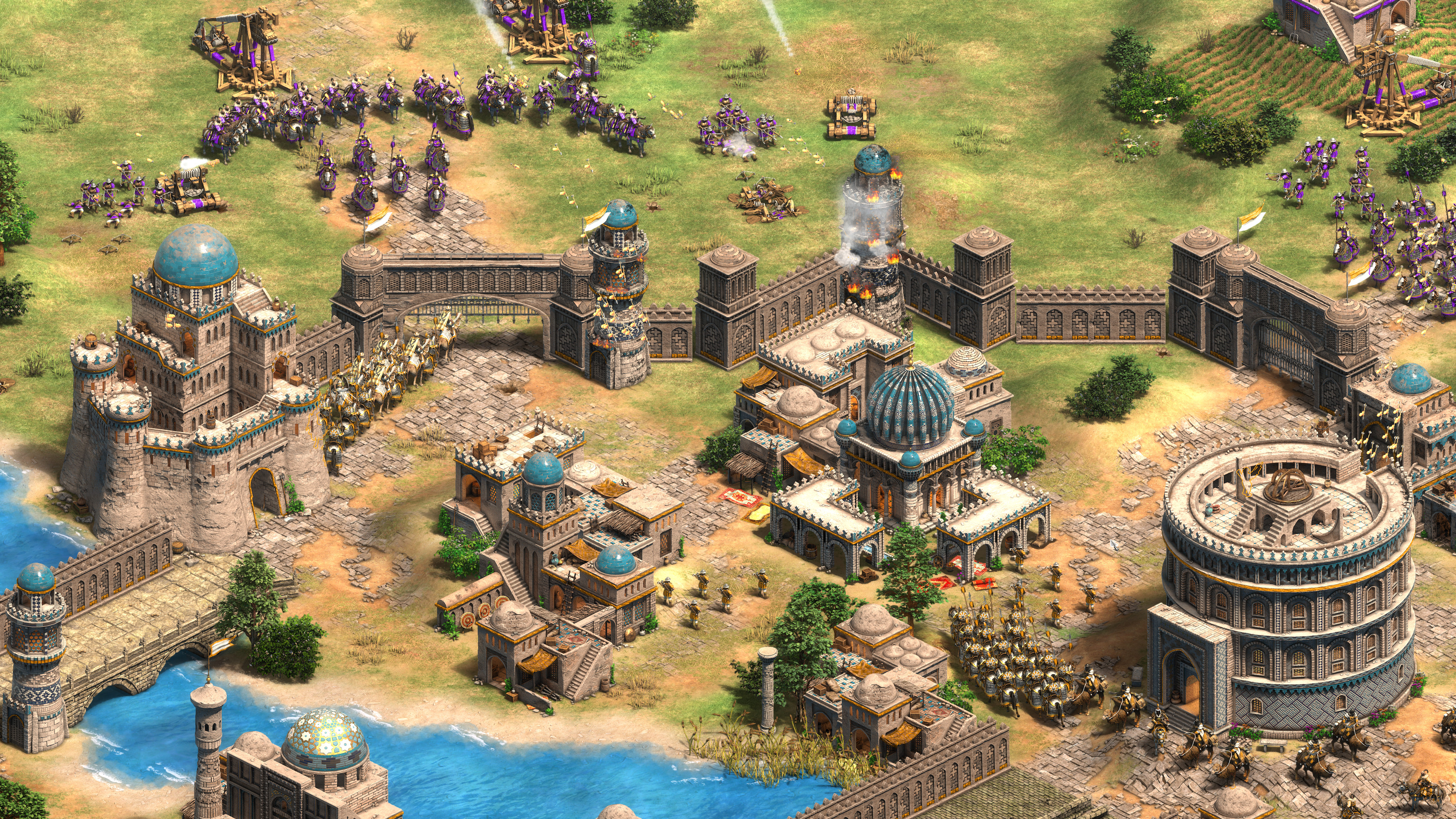 A city under siege in Age of Empires 2.