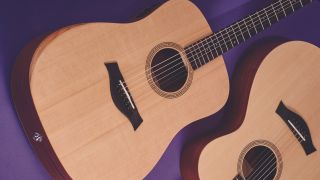 Two Taylor Academy Series acoustic guitars lying on a purple floor