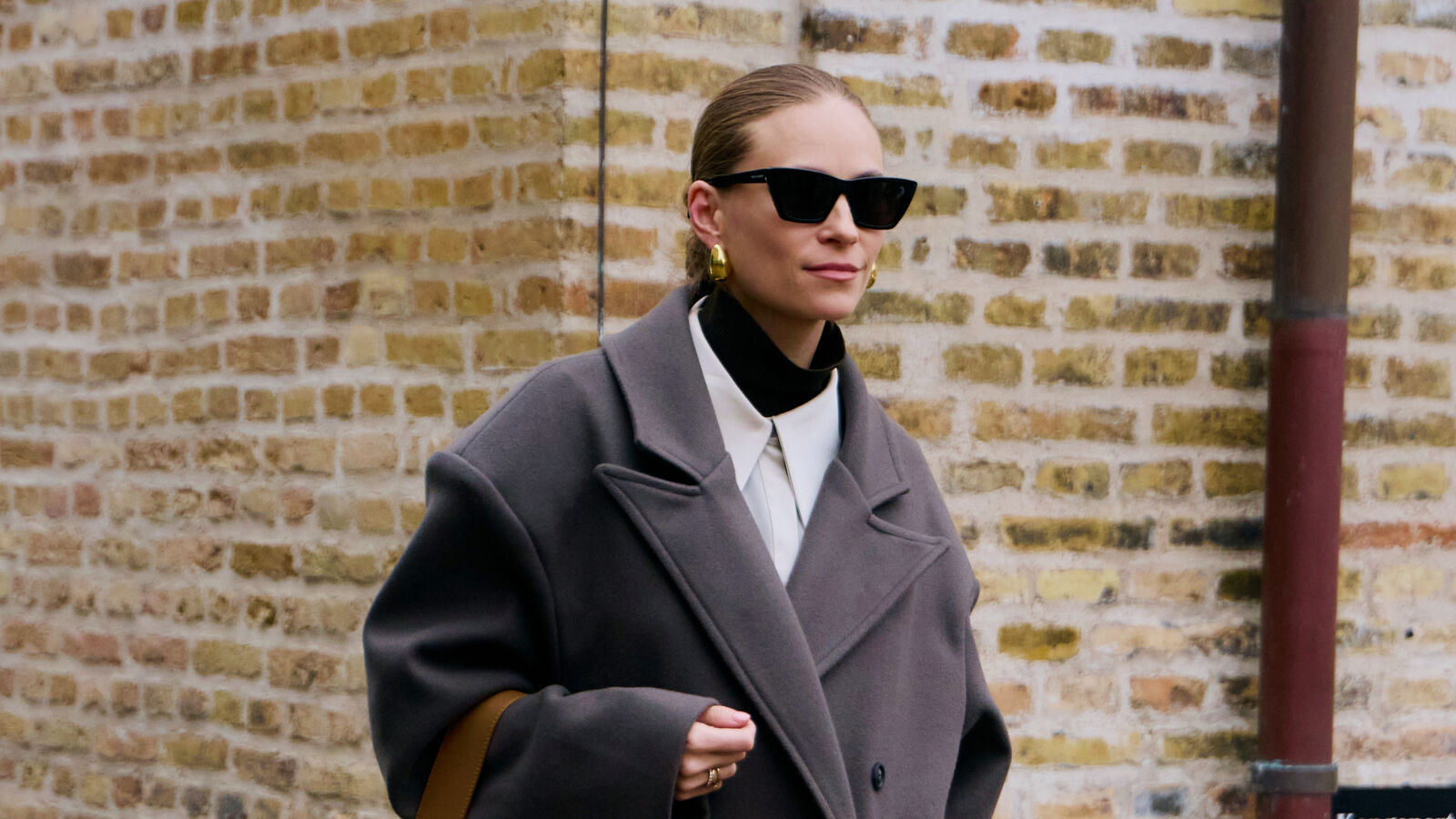 Woman featured in fall/winter 2025 Copenhagen street style photography by The Style Stalker.