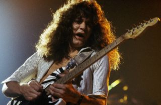 Eddie Van Halen performs with Van Halen at the Rainbow Theatre on October 22, 1978