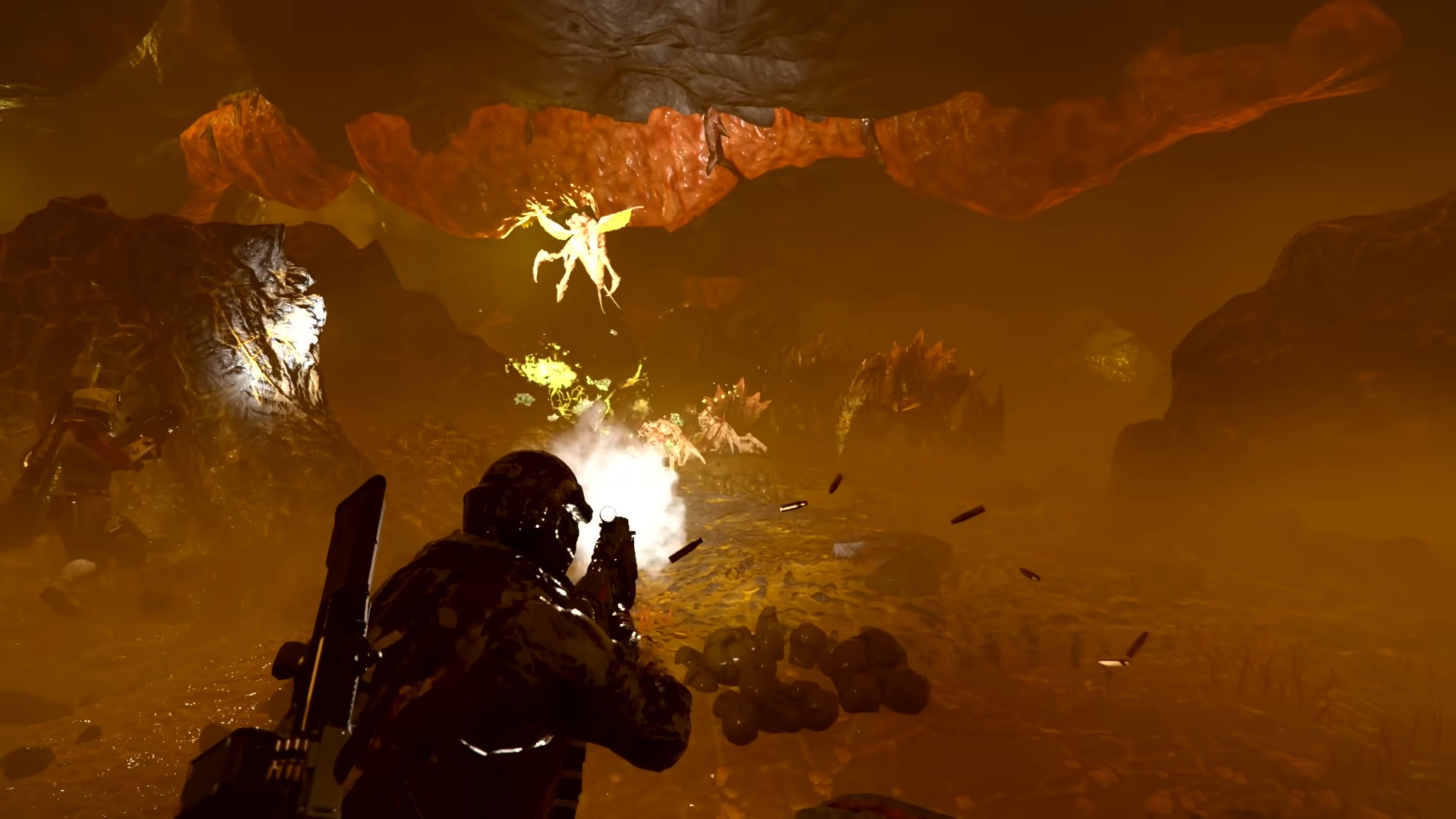 Helldivers 2 Into the Unjust update helldivers shooting terminids in hive world cave