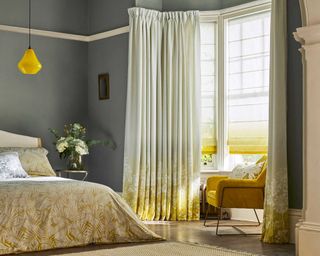 clarissa hulse x Blinds 2 Go curtains in a bedroom with yellow accessories