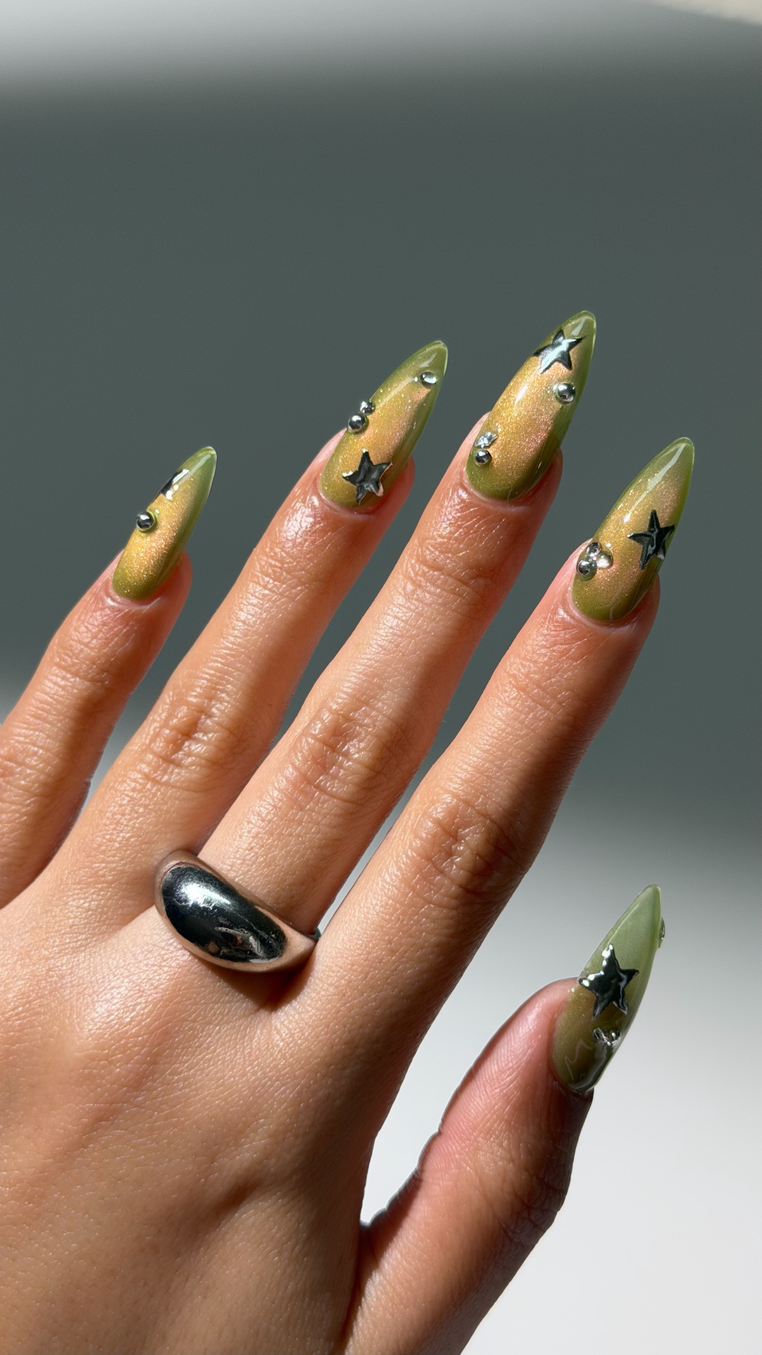 Photo of a pistachio green manicure