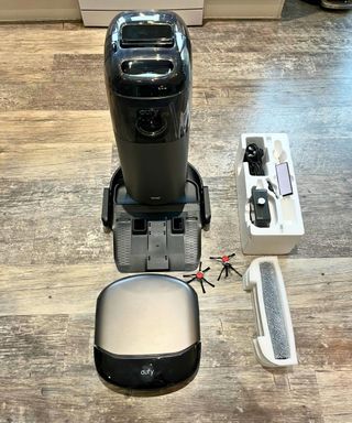 Setup of the eufy Pro S1 robot vacuum and mop pictured on my gray linoleum floor