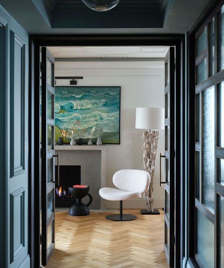Narrow entryway ideas with dark paint color
