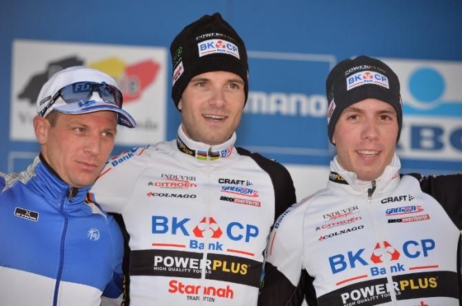 Frenchman Francis Mourey (2nd), Belgian Niels Albert (1st) and German Philipp Walsleben (3rd) celebrate on the podium