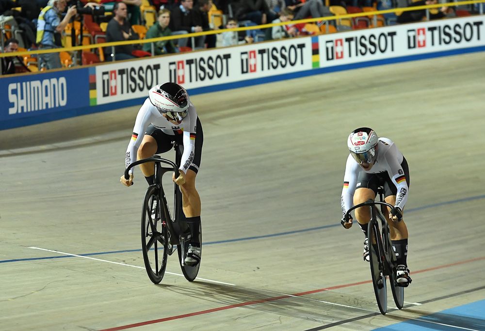 Germany's Miriam Welte (L) and Kristina Vogel compete in the women's team sprint final race at The UCI World Cycling Championships