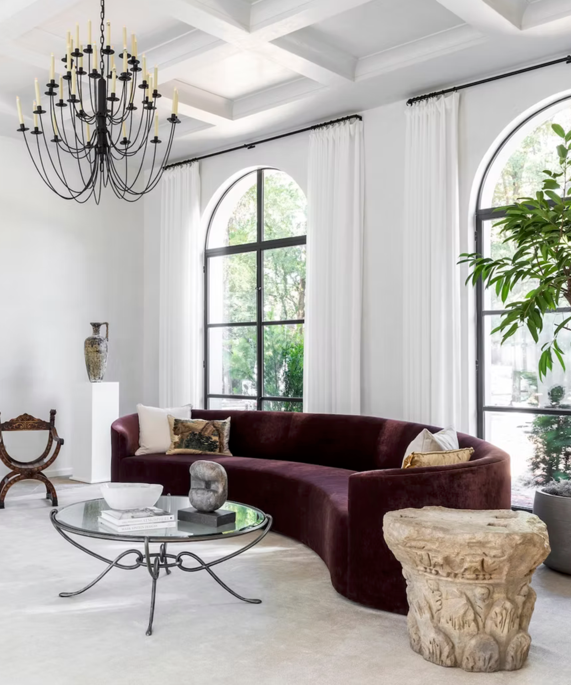 Purple curved sofa in elegant formal living room