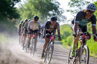 Gravel racers flock to Unbound as community grieves for Mo Wilson