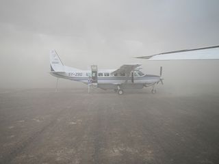 A sandstorm in Kenya in 2013 forced Glenn Schneider and a group of eclipse observers to take to the air to see the celestial event above the dust.