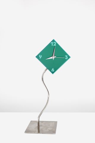 Ikea vintage clock with square green face and wriggly base