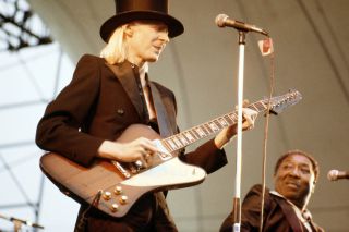 Johnny Winter performing with Muddy Waters