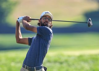 Akshay Bhatia hits a drive off the tee