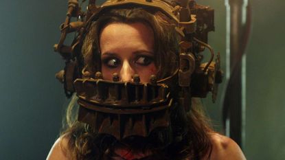 A character gets trapped in a contraption in the Saw film