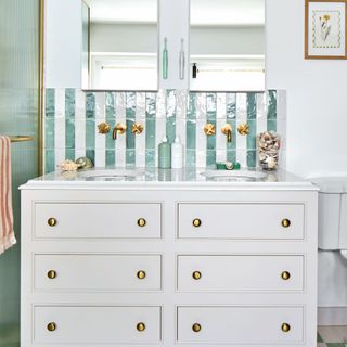 double sink vanity unity in bathroom with sea green and white wall tiles