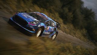 Promotional screenshot of a race car speeding along a road in EA Sports WRC.