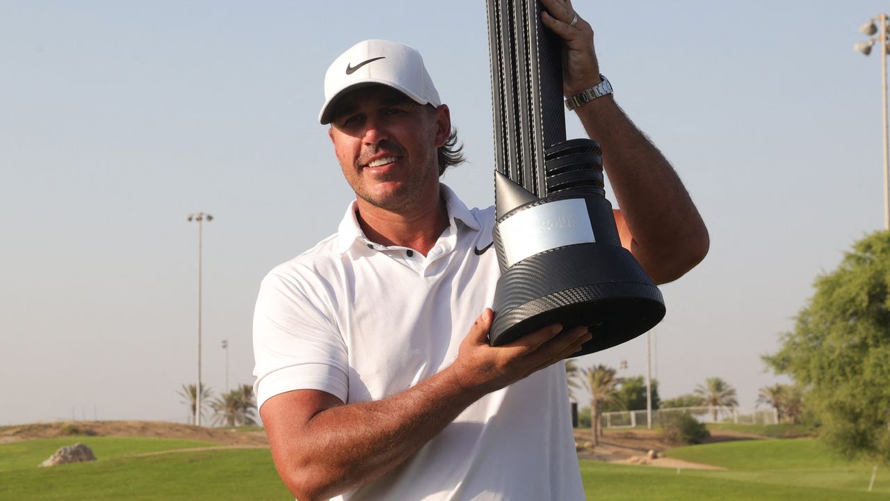 Brooks Koepka with the LIV Golf Jeddah trophy