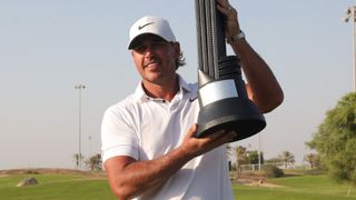 Brooks Koepka with the LIV Golf Jeddah trophy