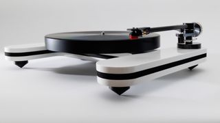 Product photo of the Luphonic H2 turntable on top of a white surface