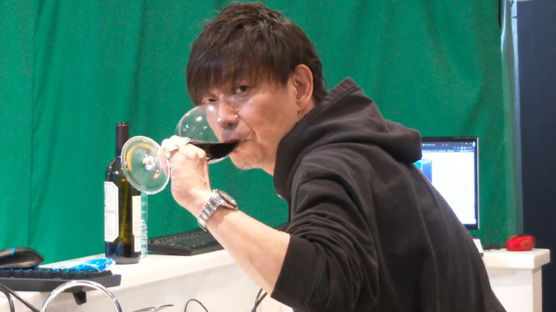 Naoki Yoshida drinking red wine